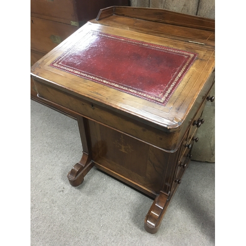 566 - A Victorian walnut Davenport with sloping front fitted with five drawers. NO RESERVE