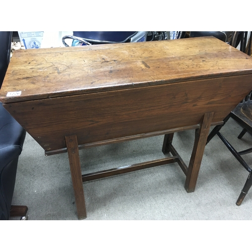 581 - A elm dough box with detachable lid on square tapering legs United by stretcher . NO RESERVE