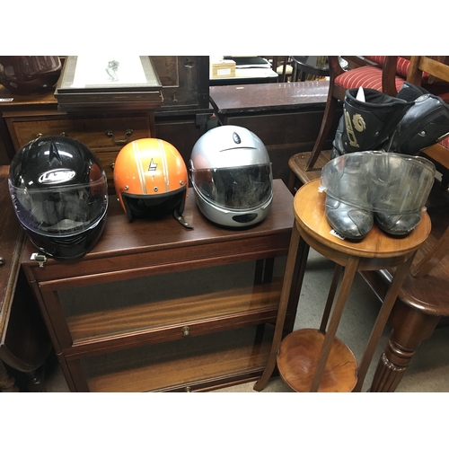 584 - Three motorcycles helmets and a pair of riding boots. Postage C. NO RESERVE