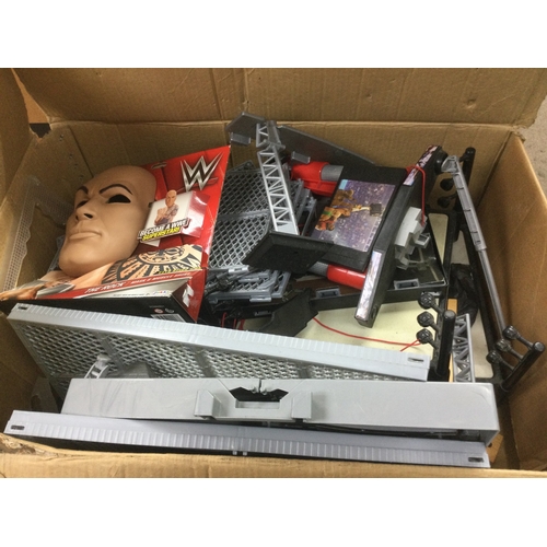 595 - A large box of WWF model wrestling items.