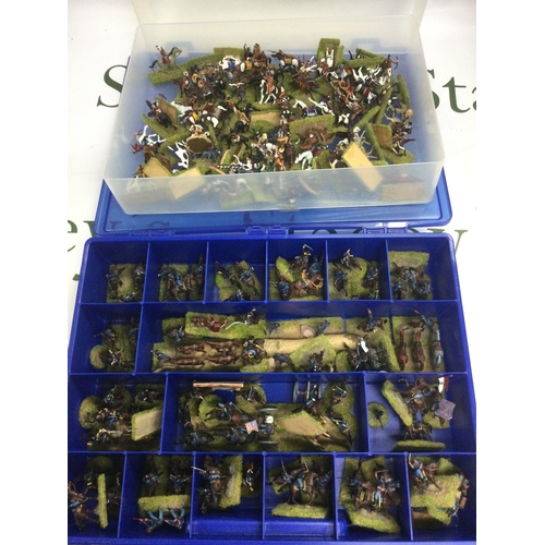 597 - A collection of die cast military vehicles and two trays of American civil war miniature figures.