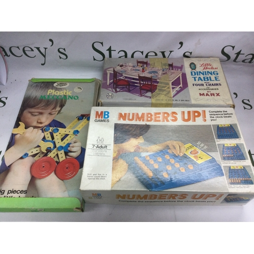 606 - A collection of vintage board games including Crossfire, Skittle Bowl, Numbers Up and others.