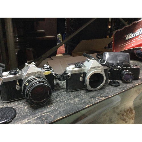 670 - A collection of vintage cameras including Pentax ME Super, Auto 10, box cameras Autographic Brownie,... 