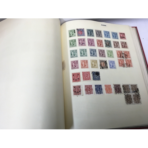 672 - A Collection of world stamp albums containing used and unused stamps from China, Brazil etc