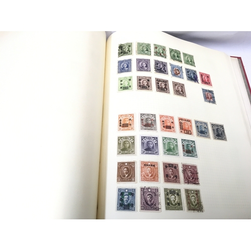 672 - A Collection of world stamp albums containing used and unused stamps from China, Brazil etc