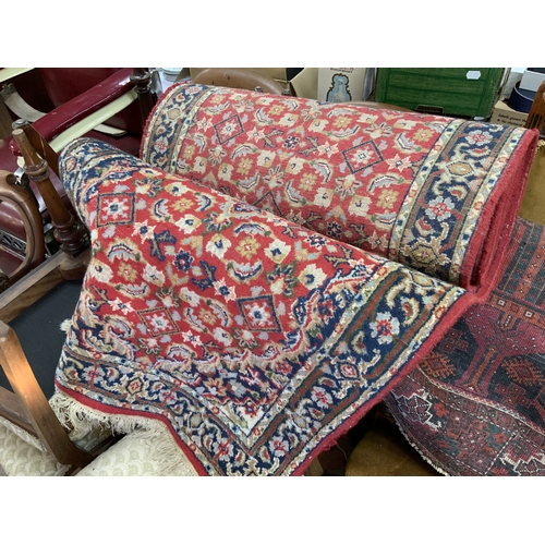 684 - 2 Persian style rugs. (D)