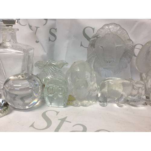 704 - A collection of glass decanters, glass items and glasses, some handmade and in the shape of animals.