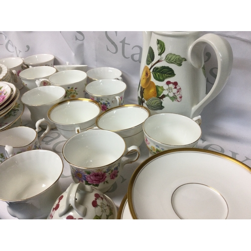 705 - A collection of Royal Albert, Queen Anne, Colclough, Richmond and other branded plates, mugs and mor... 