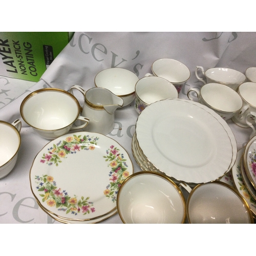 705 - A collection of Royal Albert, Queen Anne, Colclough, Richmond and other branded plates, mugs and mor... 