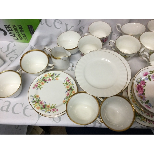 705 - A collection of Royal Albert, Queen Anne, Colclough, Richmond and other branded plates, mugs and mor... 