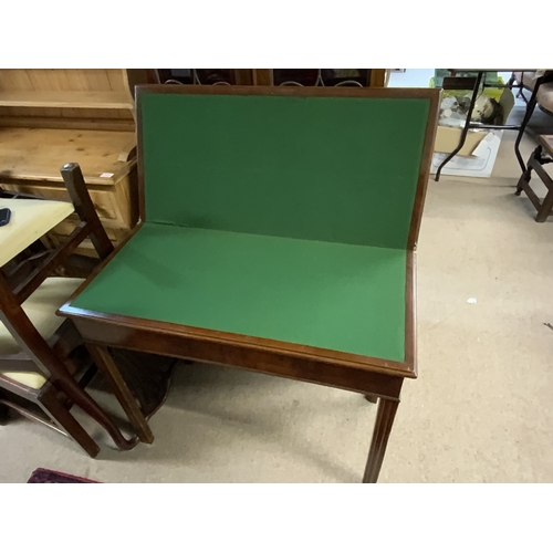 715 - A George III mahogany folding top breakfast/card table table. 88cm x 42cm x 74cm