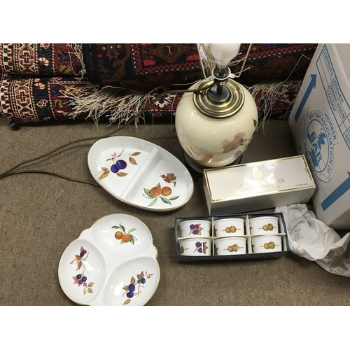 730 - A Collection of Royal Worcester Evesham dishes , a porcelain floral lamp,