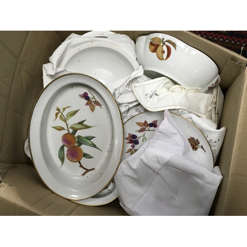 730 - A Collection of Royal Worcester Evesham dishes , a porcelain floral lamp,