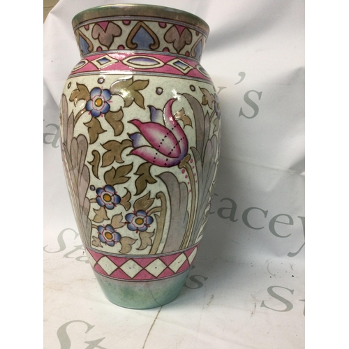 760 - A Charlotte Read tube lined Art Deco vase decorated with flowers and foliage.32 cm .