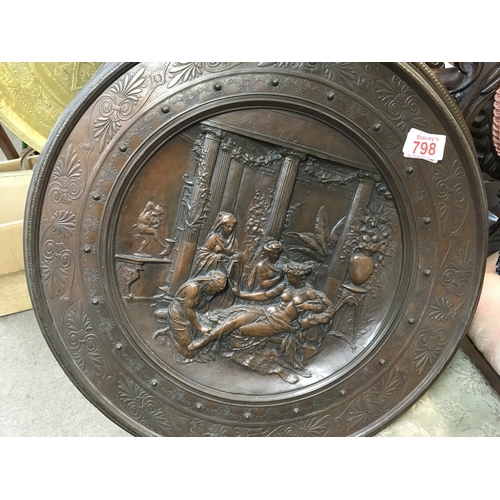 798 - Two circular bronze plaques, one depicting an Ancient Greek scene and the other depicting a scene fr... 