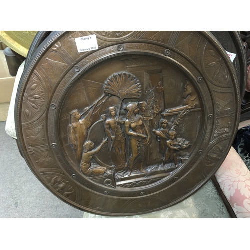 798 - Two circular bronze plaques, one depicting an Ancient Greek scene and the other depicting a scene fr... 