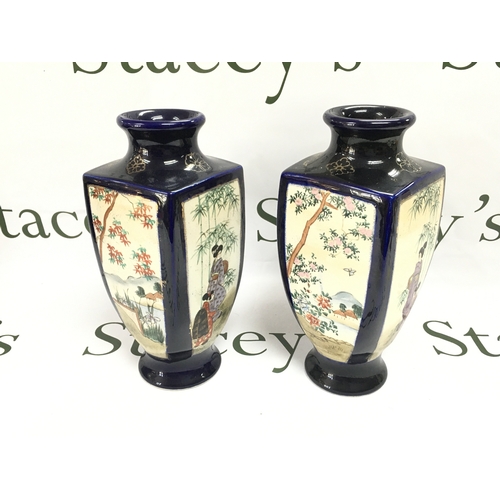 90 - A pair of Japanese vases. 25cm tall