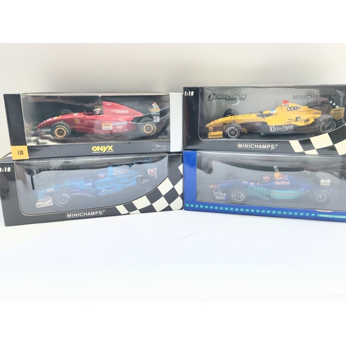 101 - 4 Boxed 1/18 Scale F1 Cars Including Minichamps and Onyx. No Reserve.