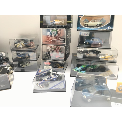 104 - A Collection of Various Racing Car Models Including Minichamps Helmet Collection . All Renault.