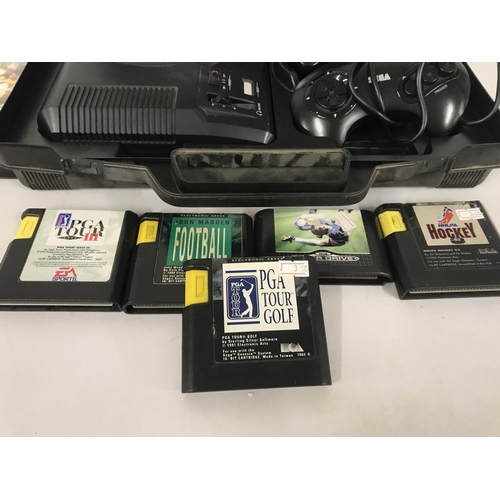 11 - A Sega mega Drive Console and a Collection of Games.