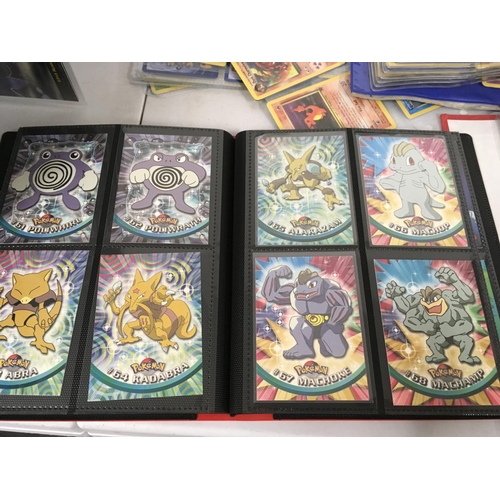 13 - A collection of 7 album sets containing numerous Pokemon cards.