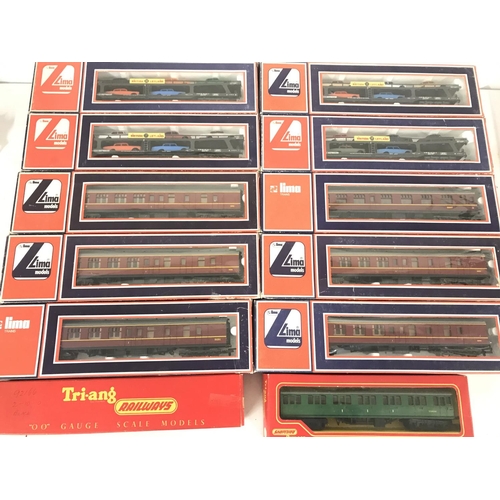 24 - A Collection of Boxed 00 Gauge Coaches and Car Loaders by Bachmann and Llima.