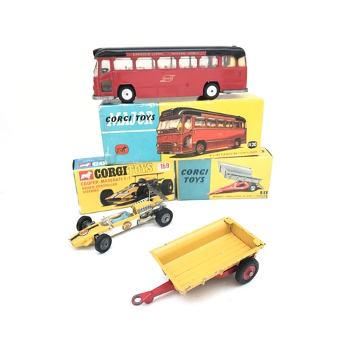 282 - A Boxed Corgi Midland Motorway Express Coach #1120. A Cooper-Maserati F/1 #159 and a Massey-Ferguson... 