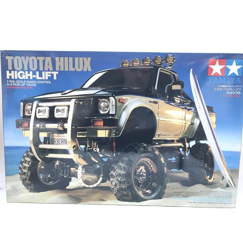 285 - A Boxed Tamiya Toyota Hilux Pick-Up Truck Radio Control Model Kit 1/10 Scale. No Reserve.