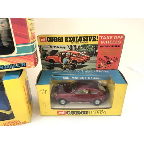 313 - A Boxed Corgi Unimog Rear Dumper #409. A Mini Marcos GT 850 and a Matchbox King Size Boat And Traile... 