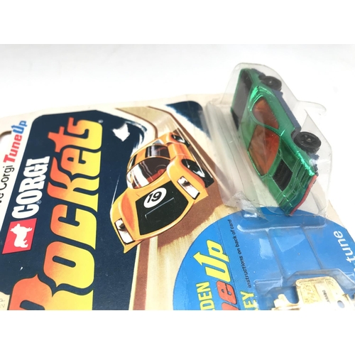 327 - 2 X Carded Corgi Rocket Cars. 1 Has Blister Damage. No Reserve.