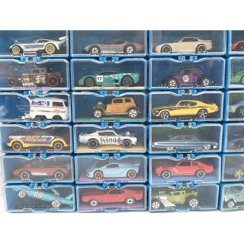 336 - A Collection of Hot Wheels Cars In a multibrick Car Case. No Reserve.