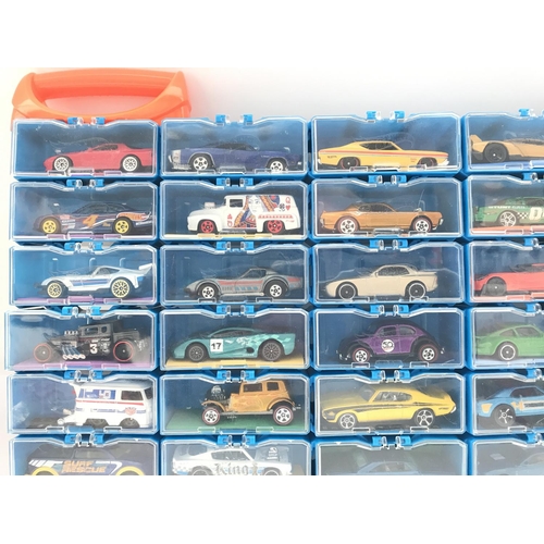 336 - A Collection of Hot Wheels Cars In a multibrick Car Case. No Reserve.