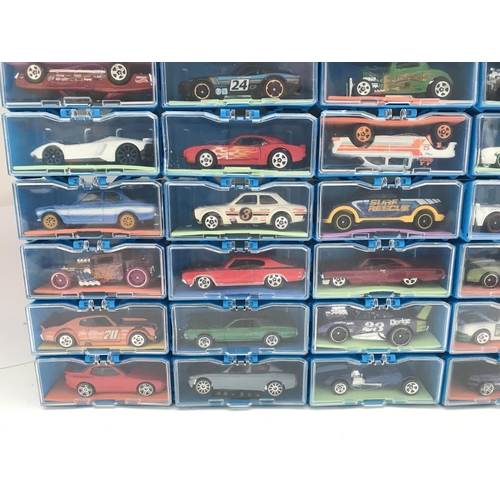 338 - A Collection of Hot Wheels Cars In a multibrick Car Case. No Reserve.