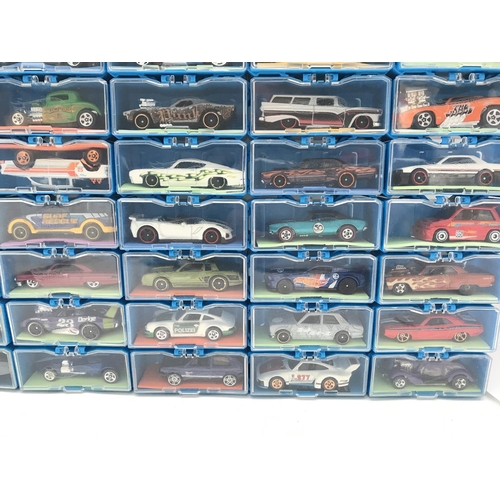 338 - A Collection of Hot Wheels Cars In a multibrick Car Case. No Reserve.