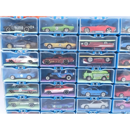 339 - A Collection of Hot Wheels Cars In a multibrick Car Case. No Reserve.