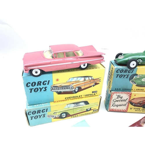 347 - A Boxed Corgi Chevrolet Impala #220. A BRM Formula 1 Grand Prix Racing Car #152. A E Type Jaguar #30... 