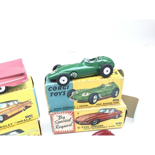 347 - A Boxed Corgi Chevrolet Impala #220. A BRM Formula 1 Grand Prix Racing Car #152. A E Type Jaguar #30... 