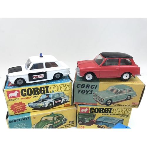 351 - A Boxed Corgi Police Panda IMP 506 an Austin A.40 Saloon #216M A Volkswagen Police Car #492 and a Pe... 