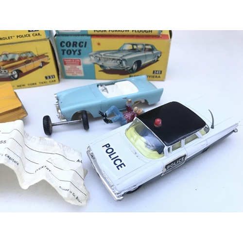 354 - A Boxed Corgi Chevrolet New York Taxi Cab #321. A Chevrolet Police Car #481 (Restored). A Four Furro... 