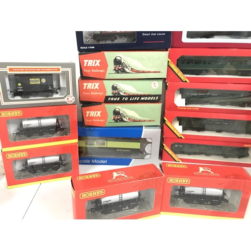 42 - A Collection of Boxed And Loose 00 Gauge Wagons and Coaches.