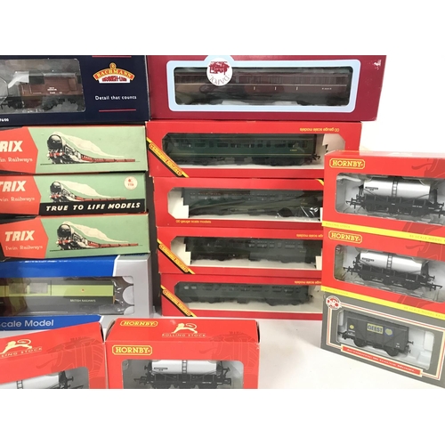 42 - A Collection of Boxed And Loose 00 Gauge Wagons and Coaches.