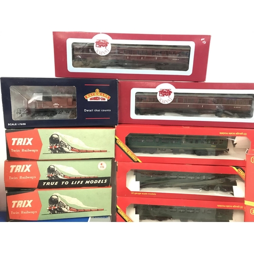 42 - A Collection of Boxed And Loose 00 Gauge Wagons and Coaches.