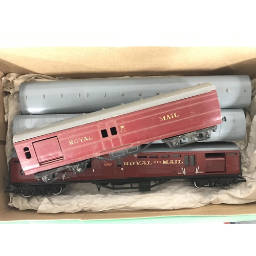 42 - A Collection of Boxed And Loose 00 Gauge Wagons and Coaches.