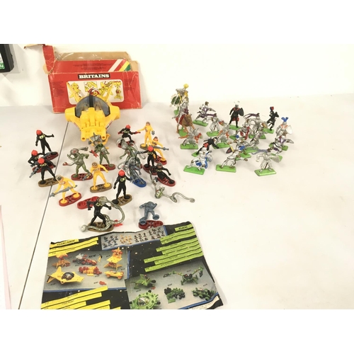 470 - A collection of Britains figures and accessories from the Space series and the knights in Armour. No... 