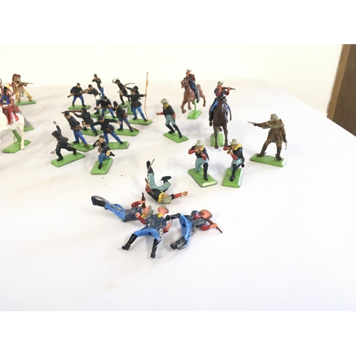 471 - A collection of Britains Deetail figures featuring Cowboys..Indians..US army and confederate.. No re... 