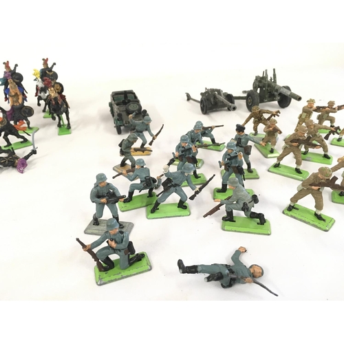 472 - A collection of Britains Deetail model figures featuring Scaracens.. German WWII soldiers and Britis... 