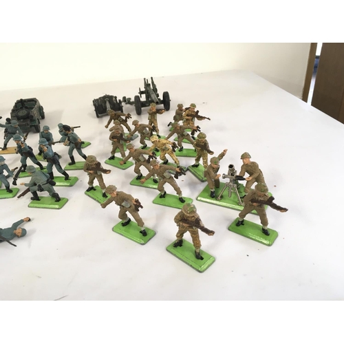 472 - A collection of Britains Deetail model figures featuring Scaracens.. German WWII soldiers and Britis... 