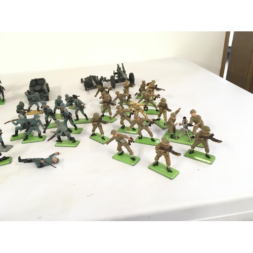 472 - A collection of Britains Deetail model figures featuring Scaracens.. German WWII soldiers and Britis... 