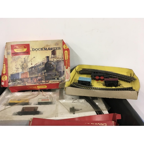 477 - A collection of both clockwork and electric model railway locomotives and accessories, primarily 00 ... 