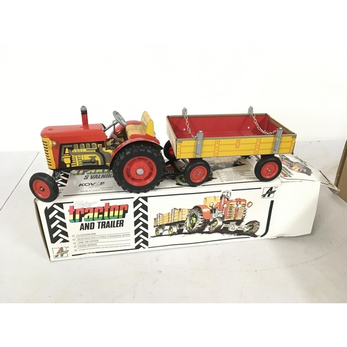 479 - A boxed Fetor clockwork Tractor and Trailer . No key. No reserve